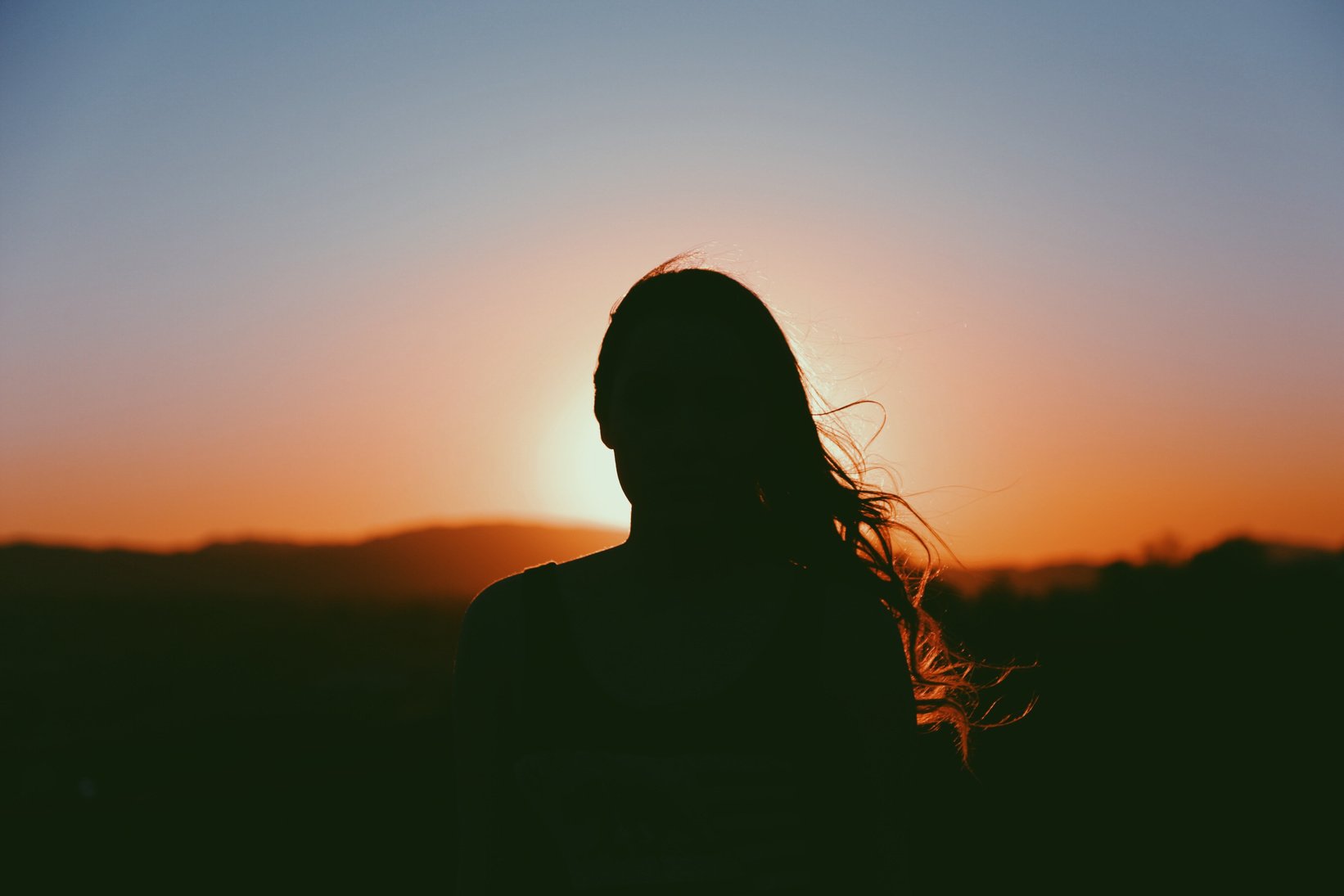 Silhouette of a Woman at Sunset